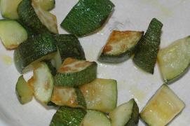 gebratene zucchiniwuerfel/diced fried zucchini